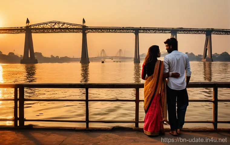 야경 명소 데이트 - **Ganga Riverbank Sunset Romance in Kolkata**
    "A romantic Indian couple (mid-20s to early 30s) s...